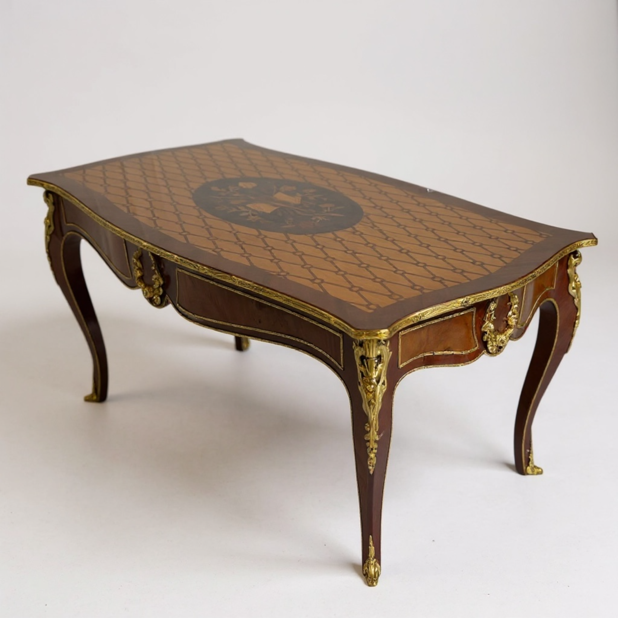 Luxury marquetry center table with copper inlays