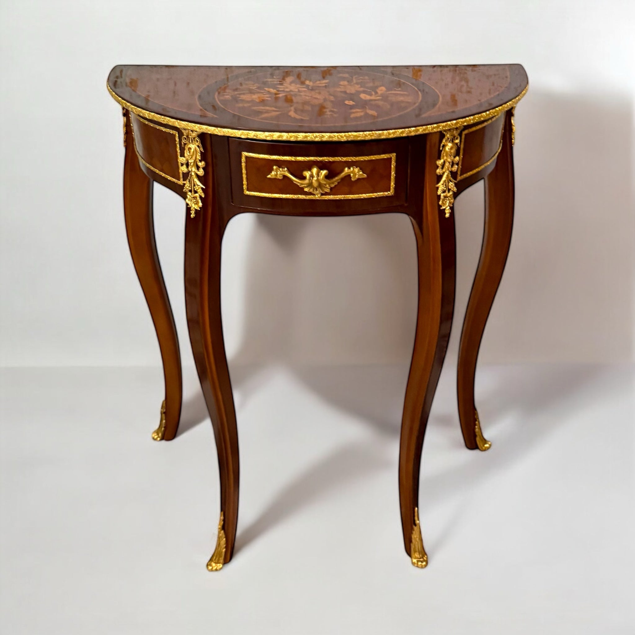 Classic semicircular table with marquetry and golden brass inlay