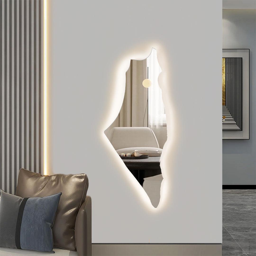 مراية "LumiPalestine" المضيئة - المواصفات تصميم فريد مستوحى من خريطة فلسطين يعكس الهوية بأسلوب عصريإضاءة ليد خلفية توفر وهجًا ناعمًا ومتناسقًا على الجدارتشغيل باللمس (تاتش) للتحكم السهل في تشغيل وإيقاف الإضاءةزجاج عالي الجودة مصمم بدقة ليمنح مظهرًا أنيقًا وعصريًامناسبة لديكورات الحداثة مما يجعلها قطعة فنية راقيةسهولة التركيب مزودة بخطاف خلفي للتعليق مع فيشة كهربائية الأبعاد الارتفاع: 145 سمالعرض: 47 سم
