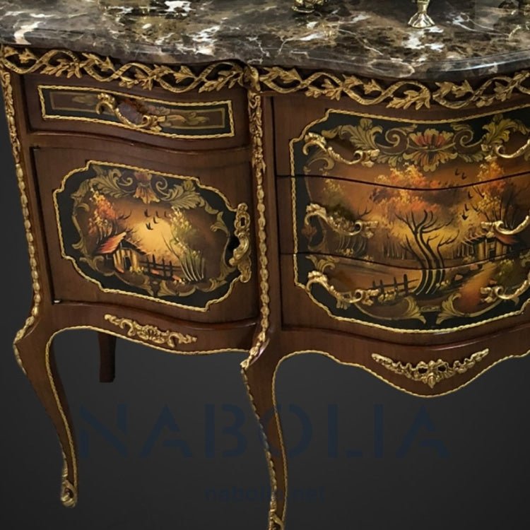 بايوه ستة ارجل -  بايوه ستة ارجل خمسة درج واتنين ضلفة من الخشب الطبيعي والرسم اليدوي ومطعم بالنحاس المشغول يدويا والرخام امبرادور غامق المقاسات: W 120 CM * L 90 CM