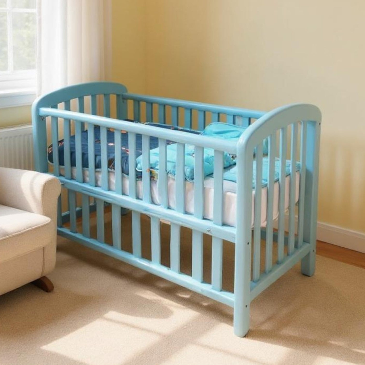 Blue rocking baby bed
