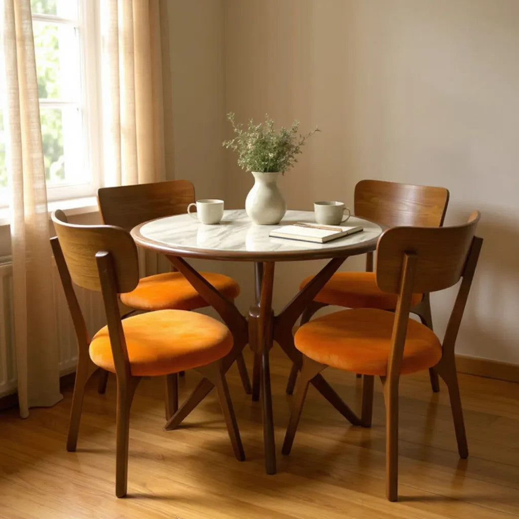 Round dining table with four chairs