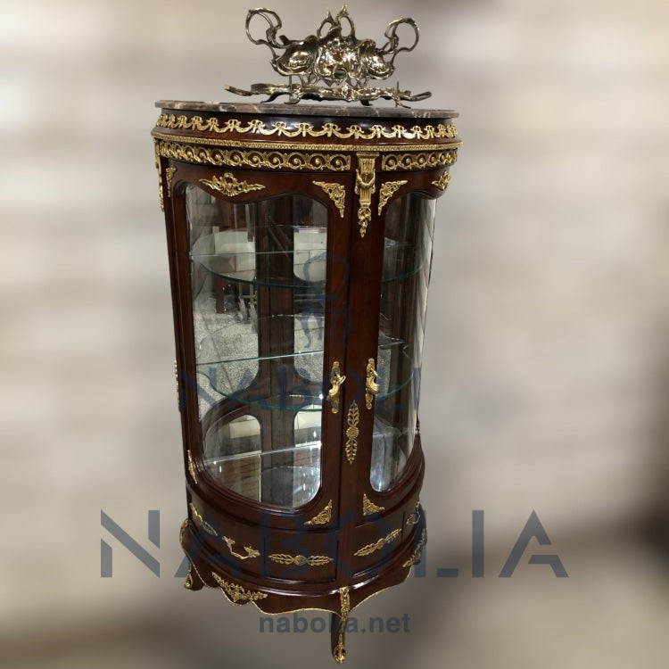 فاترينة نصف دائرية - فاترينة نصف دائرية مصنعة من الاخشاب الطبيعية و مطعمة بالنحاس اتنين ضلفة واتنين درج المقاسات: W 90 CM * H 150 CM