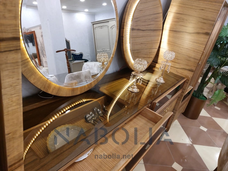 سفرة مودرن قشرة افريقي - سفرة مودرن لون بني مع زجاج بني غامق مصنعة من الاخشاب والقشرة الافريقي الطبيعية والسفرة مكونة من : بوفيه190 سنتميتر اتنين برواز دائري باضاءة خفيفة اتنين نيش 65 سنتميتر ترابيزة 2 * 1 متر ستة كراسي قماش جلد مقلوب