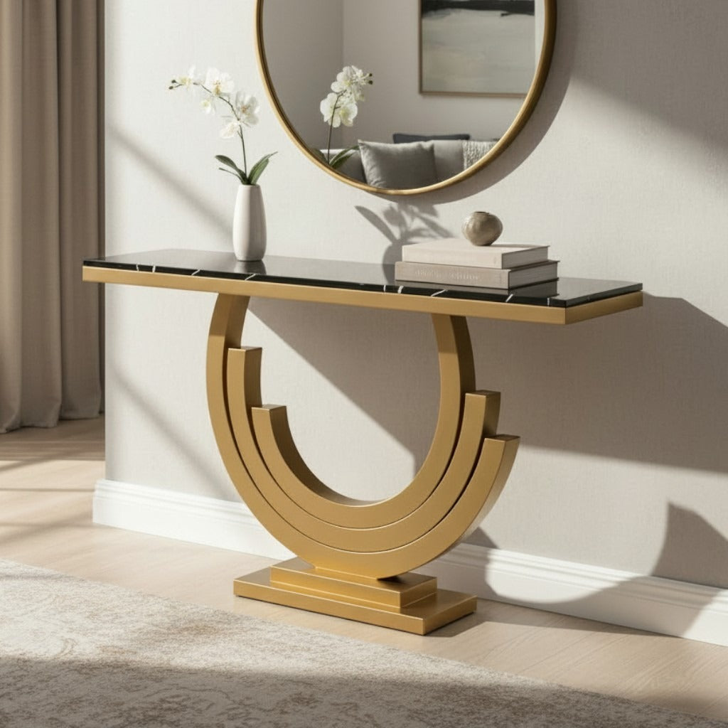 كونسول مدخل مودرن بقاعدة معدنية ذهبية وسطح أسود رخامي