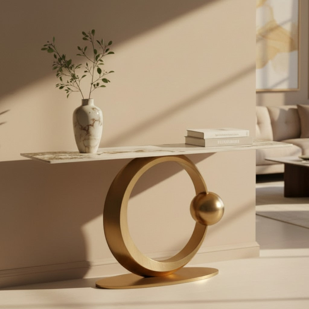 كونسول مدخل مودرن بقاعدة دائرية ذهبية وسطح رخامي فاتح